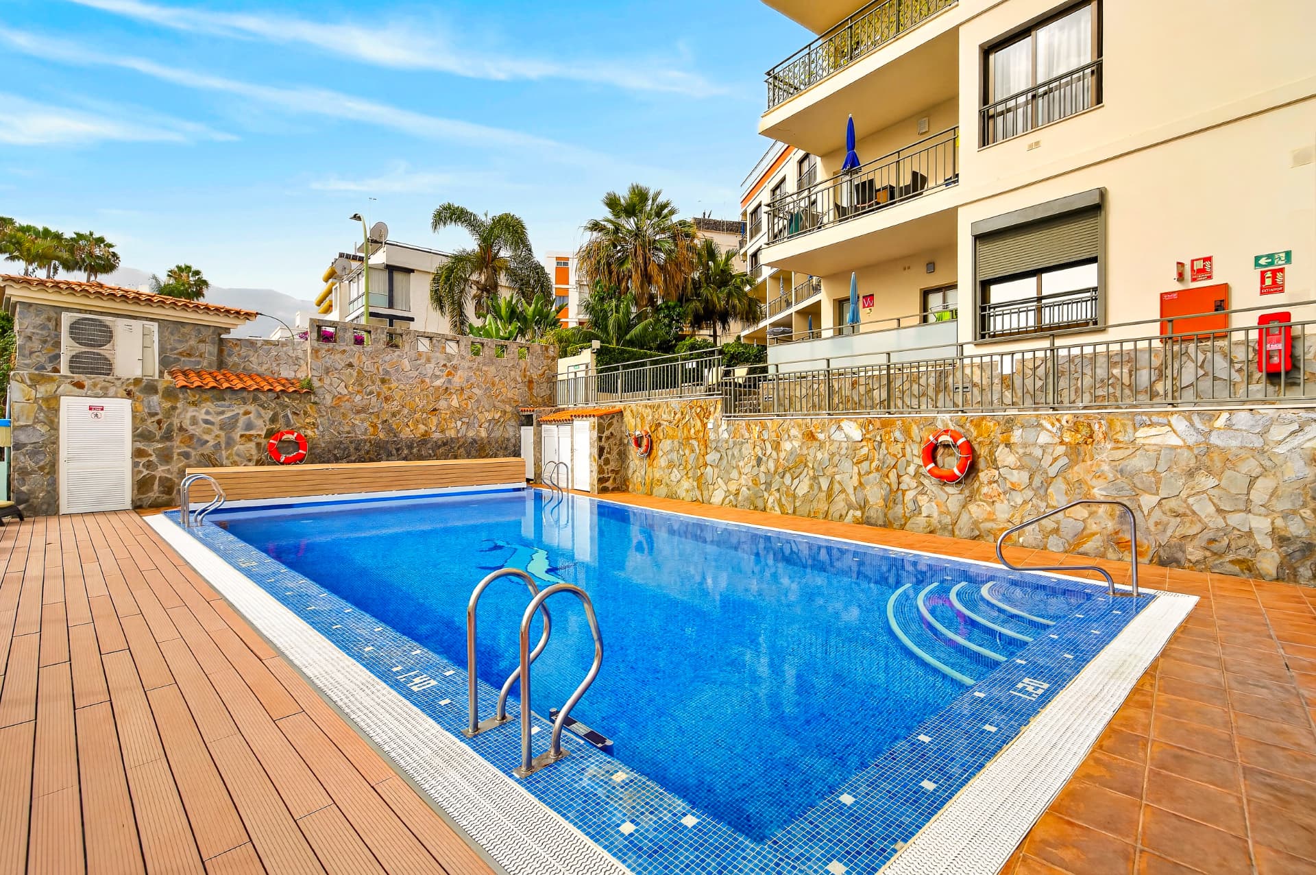 Heated pool with sun terrace and loungers